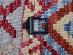 Corner detail of New Modern Design rug showing border pattern and Wool pile