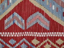 Backside of handmade New Modern Design rug showing knot structure and weave density