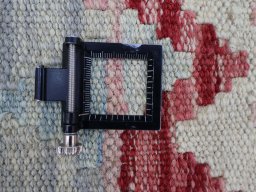 Corner detail of New Modern Design rug showing border pattern and Wool pile