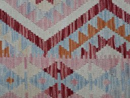 Backside of handmade New Modern Design rug showing knot structure and weave density