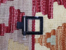 Corner detail of New Modern Design rug showing border pattern and Wool pile
