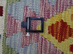 Corner detail of New Modern Design rug showing border pattern and Wool pile