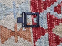 Corner detail of New Modern Design rug showing border pattern and Wool pile