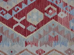 Backside of handmade New Modern Design rug showing knot structure and weave density