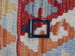 Corner detail of New Modern Design rug showing border pattern and Wool pile