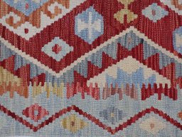 Backside of handmade New Modern Design rug showing knot structure and weave density