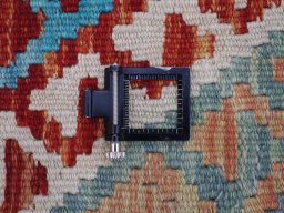 Corner detail of New Modern Design rug showing border pattern and Wool pile