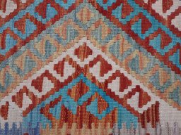 Backside of handmade New Modern Design rug showing knot structure and weave density