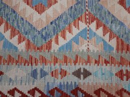 Backside of handmade New Modern Design rug showing knot structure and weave density