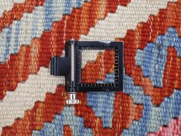 Corner detail of New Modern Design rug showing border pattern and Wool pile