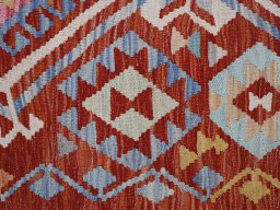 Backside of handmade New Modern Design rug showing knot structure and weave density