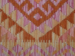 Backside of handmade New Modern Design rug showing knot structure and weave density