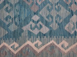 Backside of handmade New Modern Design rug showing knot structure and weave density