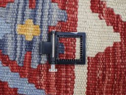 Corner detail of New Modern Design rug showing border pattern and Wool pile