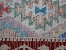 Backside of handmade New Modern Design rug showing knot structure and weave density