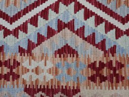 Backside of handmade New Modern Design rug showing knot structure and weave density