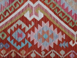 Backside of handmade New Modern Design rug showing knot structure and weave density