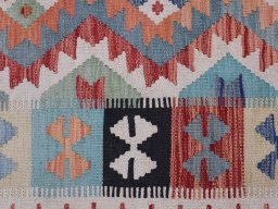 Backside of handmade New Modern Design rug showing knot structure and weave density