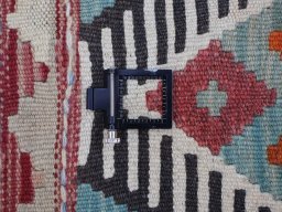 Corner detail of New Modern Design rug showing border pattern and Wool pile