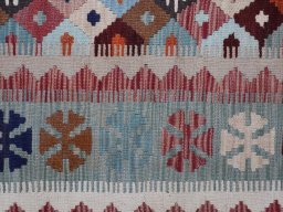 Backside of handmade New Modern Design rug showing knot structure and weave density