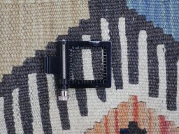 Corner detail of New Modern Design rug showing border pattern and Wool pile