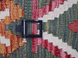 Corner detail of New Modern Design rug showing border pattern and Wool pile