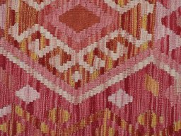 Backside of handmade New Modern Design rug showing knot structure and weave density
