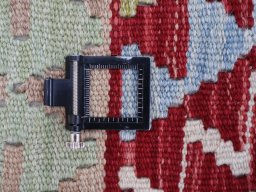Corner detail of New Modern Design rug showing border pattern and Wool pile
