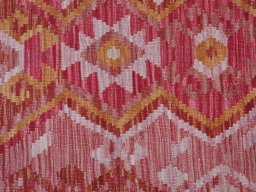 Backside of handmade New Modern Design rug showing knot structure and weave density