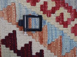 Corner detail of New Modern Design rug showing border pattern and Wool pile