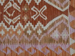 Backside of handmade New Modern Design rug showing knot structure and weave density