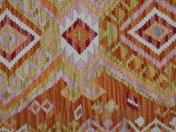 Backside of handmade New Modern Design rug showing knot structure and weave density