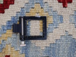 Corner detail of New Modern Design rug showing border pattern and Wool pile