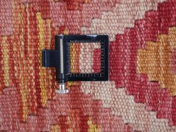 Corner detail of New Modern Design rug showing border pattern and Wool pile