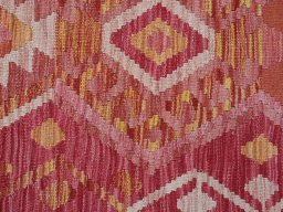 Backside of handmade New Modern Design rug showing knot structure and weave density