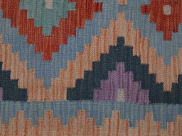 Backside of handmade New Modern Design rug showing knot structure and weave density