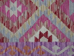Backside of handmade New Modern Design rug showing knot structure and weave density