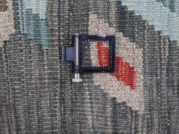 Corner detail of New Modern Design rug showing border pattern and Wool pile