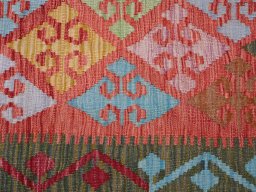 Backside of handmade New Modern Design rug showing knot structure and weave density