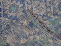Surface texture of New Modern Design rug with natural Wool and intricate pattern
