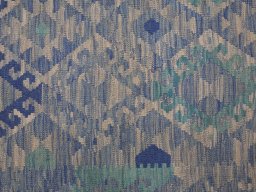 Backside of handmade New Modern Design rug showing knot structure and weave density
