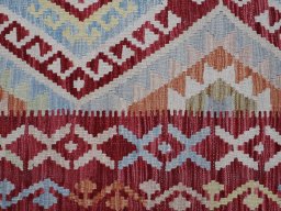 Backside of handmade New Modern Design rug showing knot structure and weave density