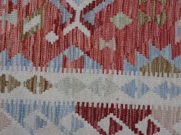 Backside of handmade New Modern Design rug showing knot structure and weave density