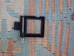 Corner detail of New Modern Design rug showing border pattern and Wool pile