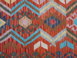 Backside of handmade New Modern Design rug showing knot structure and weave density