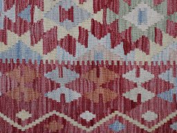 Backside of handmade New Modern Design rug showing knot structure and weave density