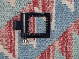Corner detail of New Modern Design rug showing border pattern and Wool pile