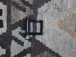 Corner detail of New Modern Design rug showing border pattern and Wool pile