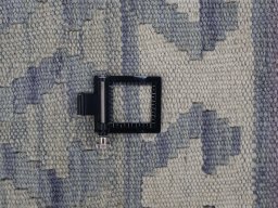 Corner detail of New Modern Design rug showing border pattern and Wool pile