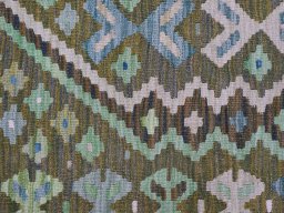Backside of handmade New Modern Design rug showing knot structure and weave density
